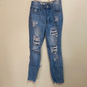 Distressed blue jeans